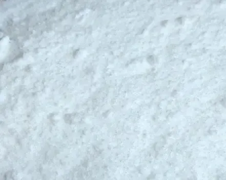Close-up of white crystalline powder, an illustration of a BHB salt